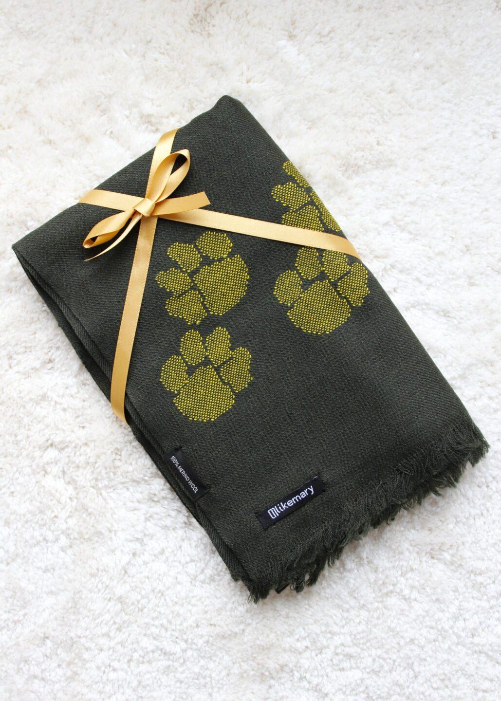 Handwoven Merino Wool Blanket Scarf in Green with Paws Motif - likemary