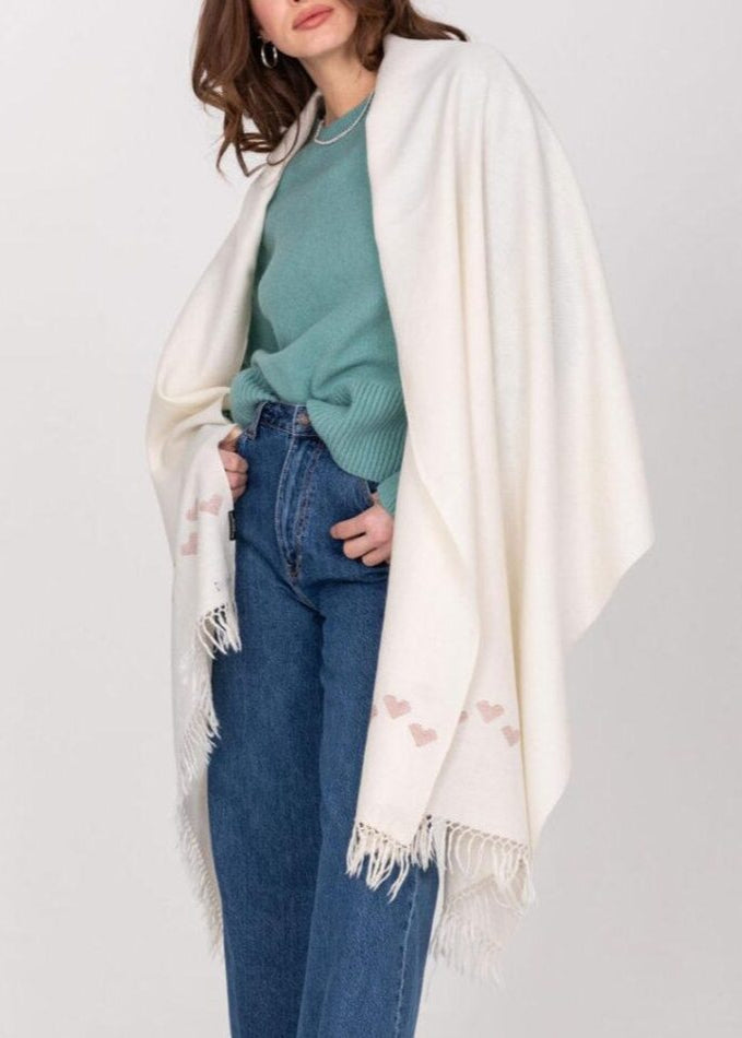 sustainable and handmade merino blanket scarf in cream with love hearts, perfect for gifting