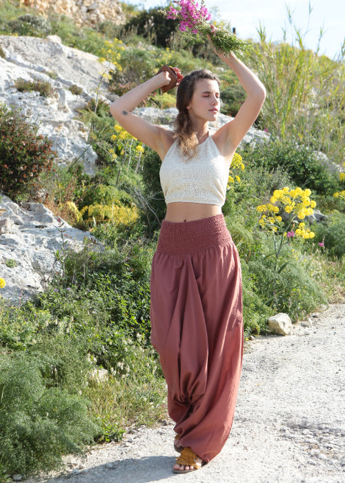 pink harem pants styled with crop top for warm weather outfit